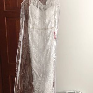 Unworn floor length wedding dress